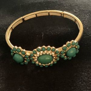 Stretchy gold tone bracelet